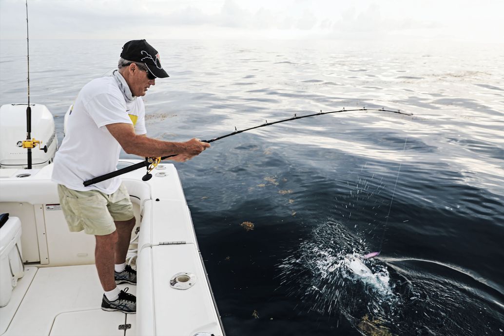 An angler prepares to leader a successful slow-pitch catch