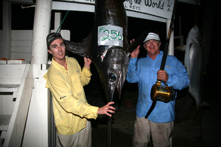 Nick Stanczyk and George Poveromo, with a 256-lb. swordfish.